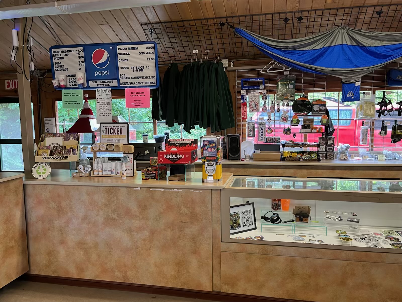 From the inside, the country store counter shows their menu and offerings.